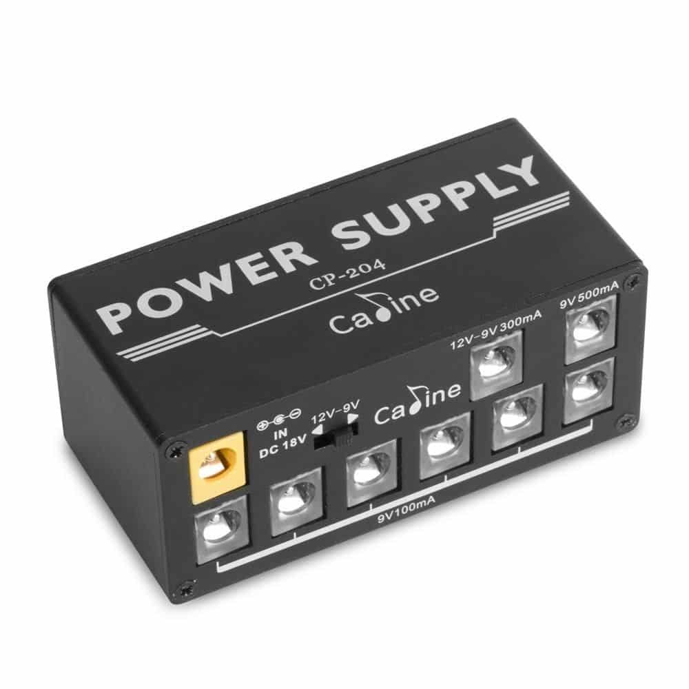img src="/caline-multistrømforsyning" alt="Caline CP-204 Mini Power Multistrømforsyning"